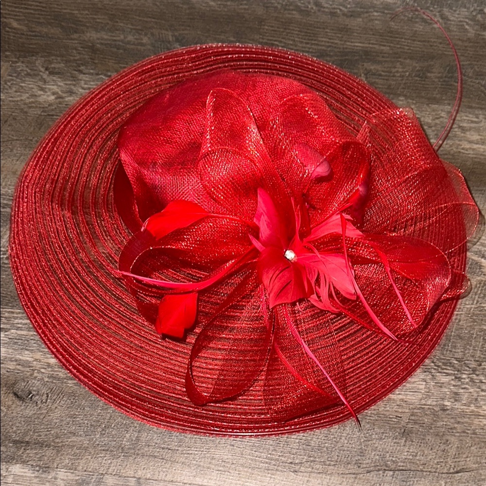 Vibrant Red Wide-Brimmed Hat with Floral Embellishment